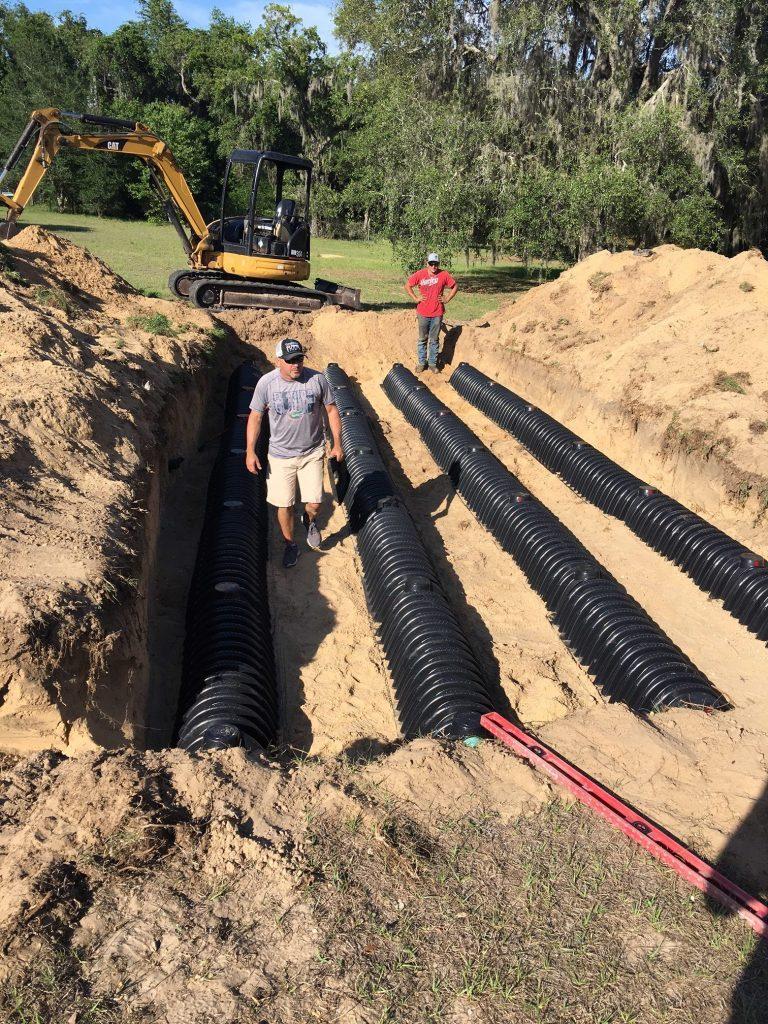 Septic drain field chambers being installed